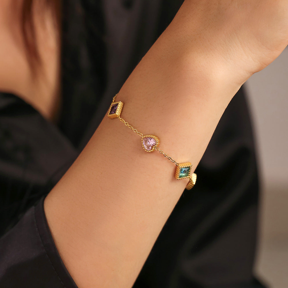 Pulsera de acero inoxidable con circonitas cuadradas y corazón
