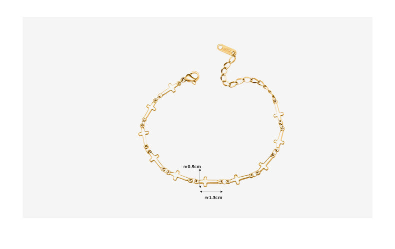 Pulsera de acero inoxidable con diseño de cruz bañada en oro
