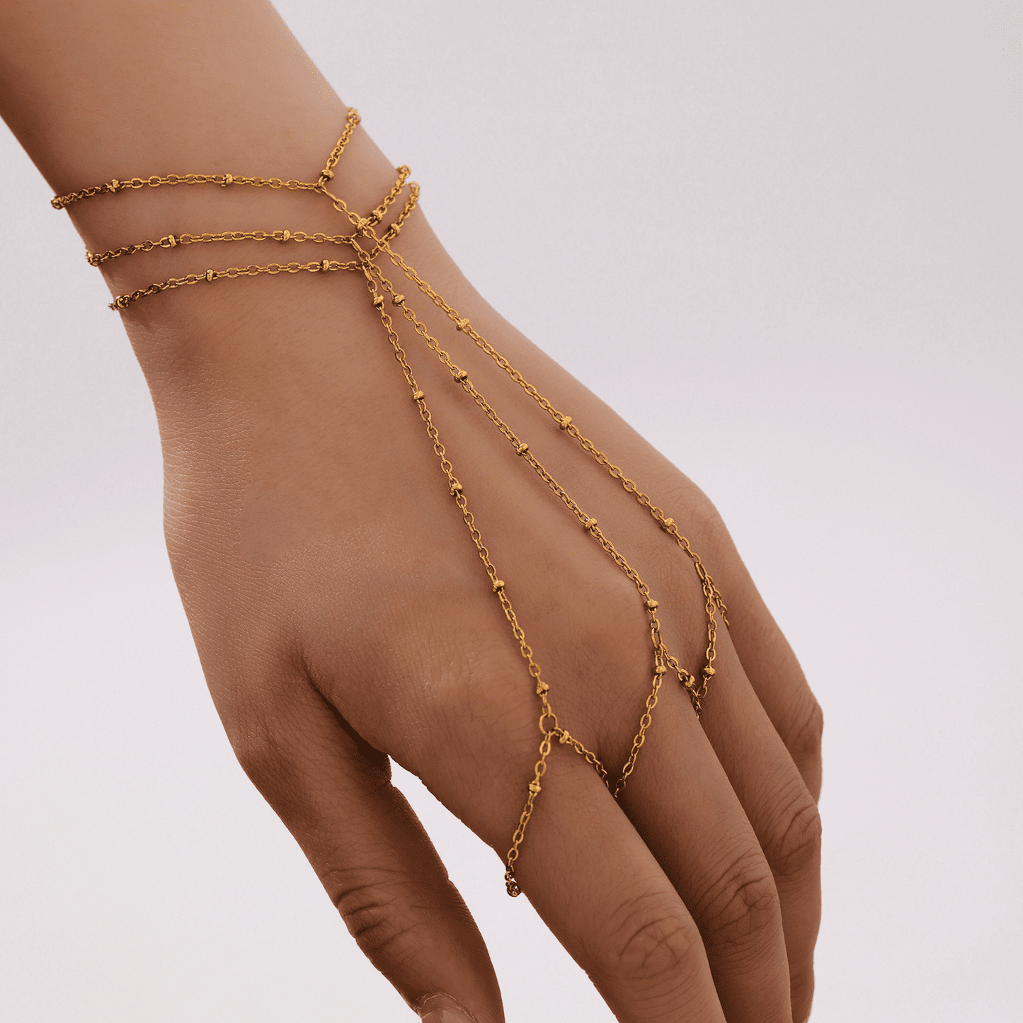 Pulsera de tenis asimétrica con cuentas doradas | Acero resistente al agua y a la decoloración