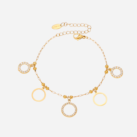 Pulsera de circonitas redondas de acero inoxidable bañada en oro de 18 quilates