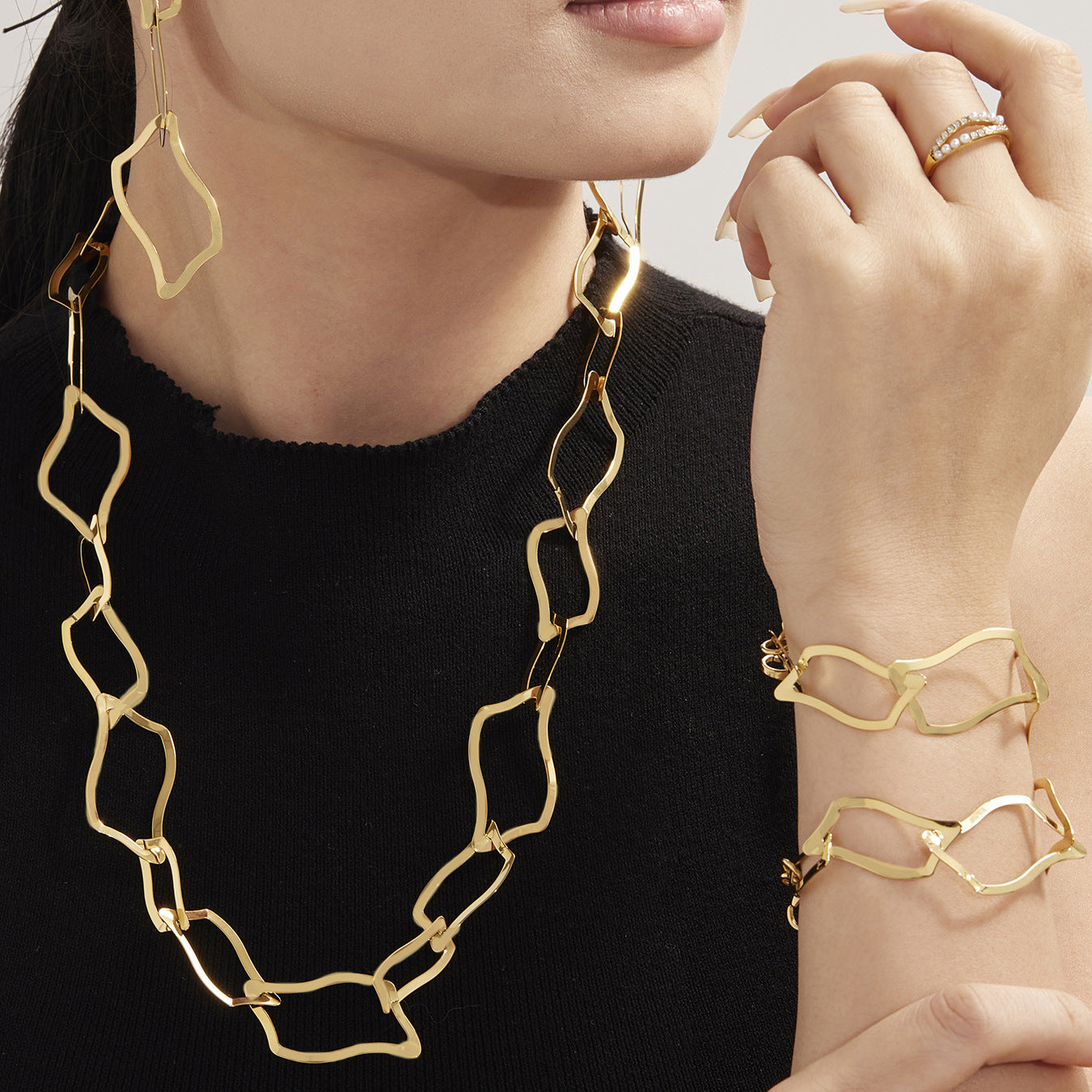 Pulsera de oro de 18 quilates con combinación de cuadriláteros irregulares