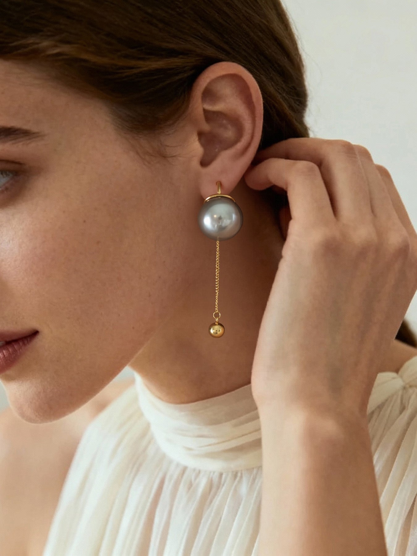 Pendientes de flecos de diseñador con detalles de perlas