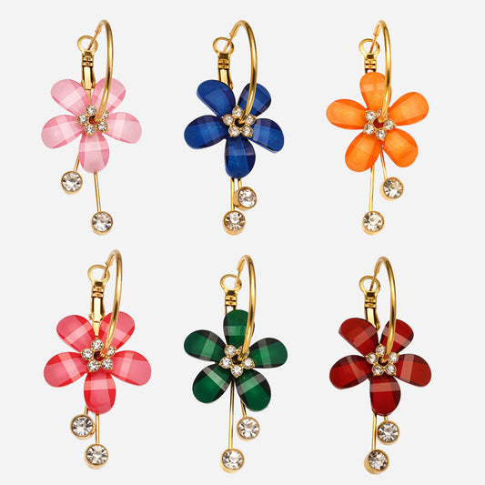 Elegantes pendientes de camelia con borlas de diamantes