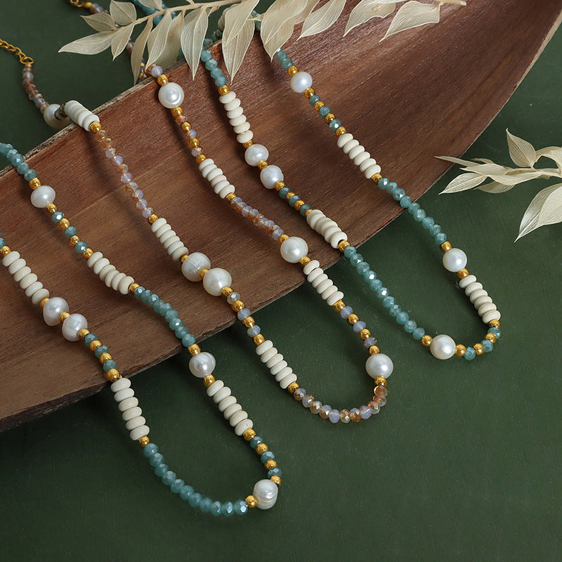 Lifestyle image of colorful beaded necklace placed in sunlight