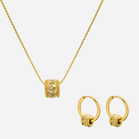 Gold necklace and hoop earrings on a white background