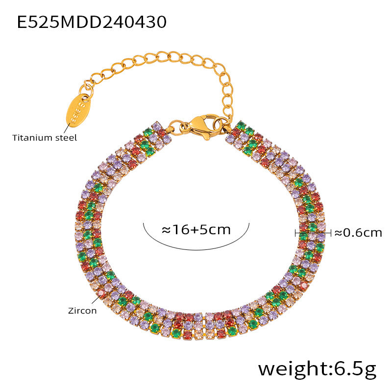 Vibrant rainbow zircon bracelet with gold clasp on white background – durable stainless steel