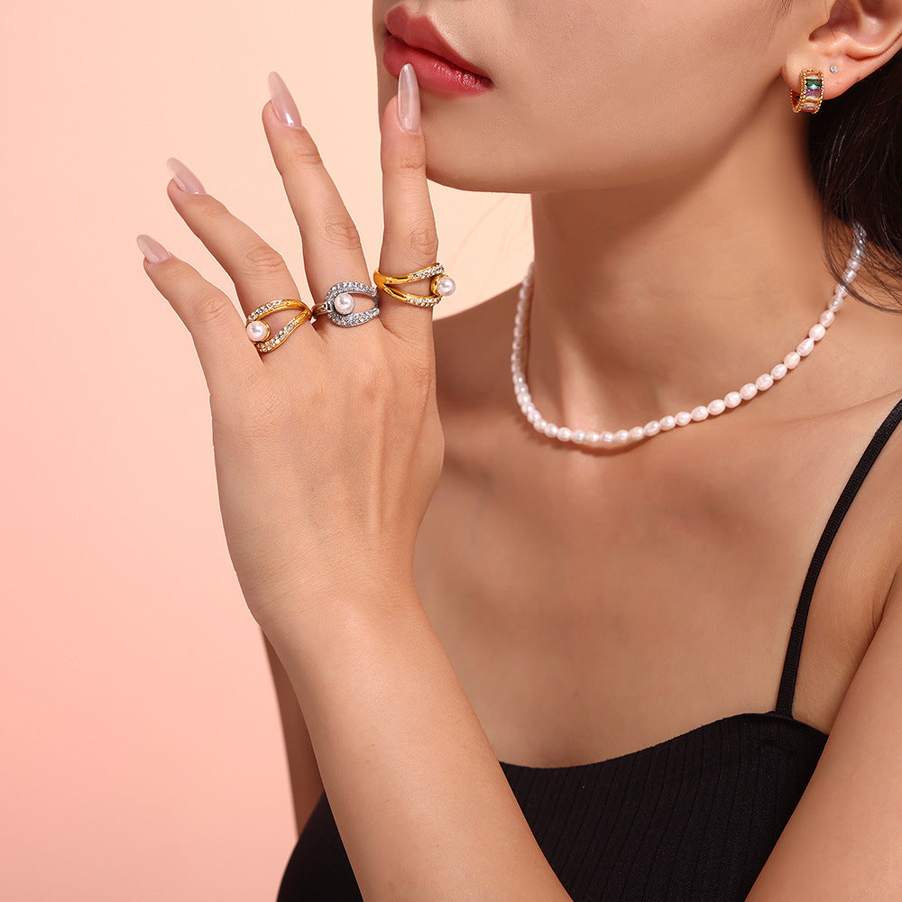 Anillos de acero inoxidable con perlas de imitación y circonitas