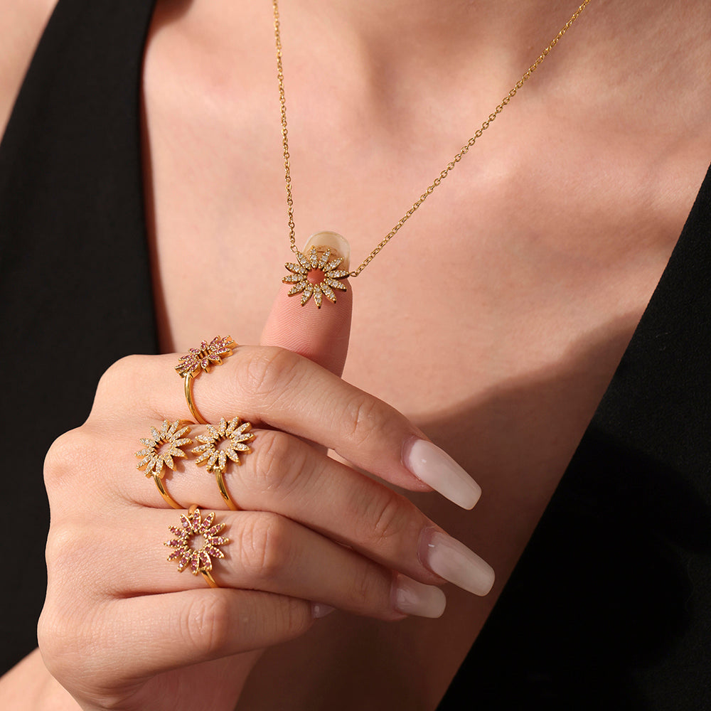 Anillos ajustables de acero inoxidable con circonita y girasol
