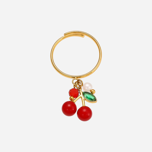 Anillos de acero inoxidable con cereza roja y incrustaciones de circonitas.