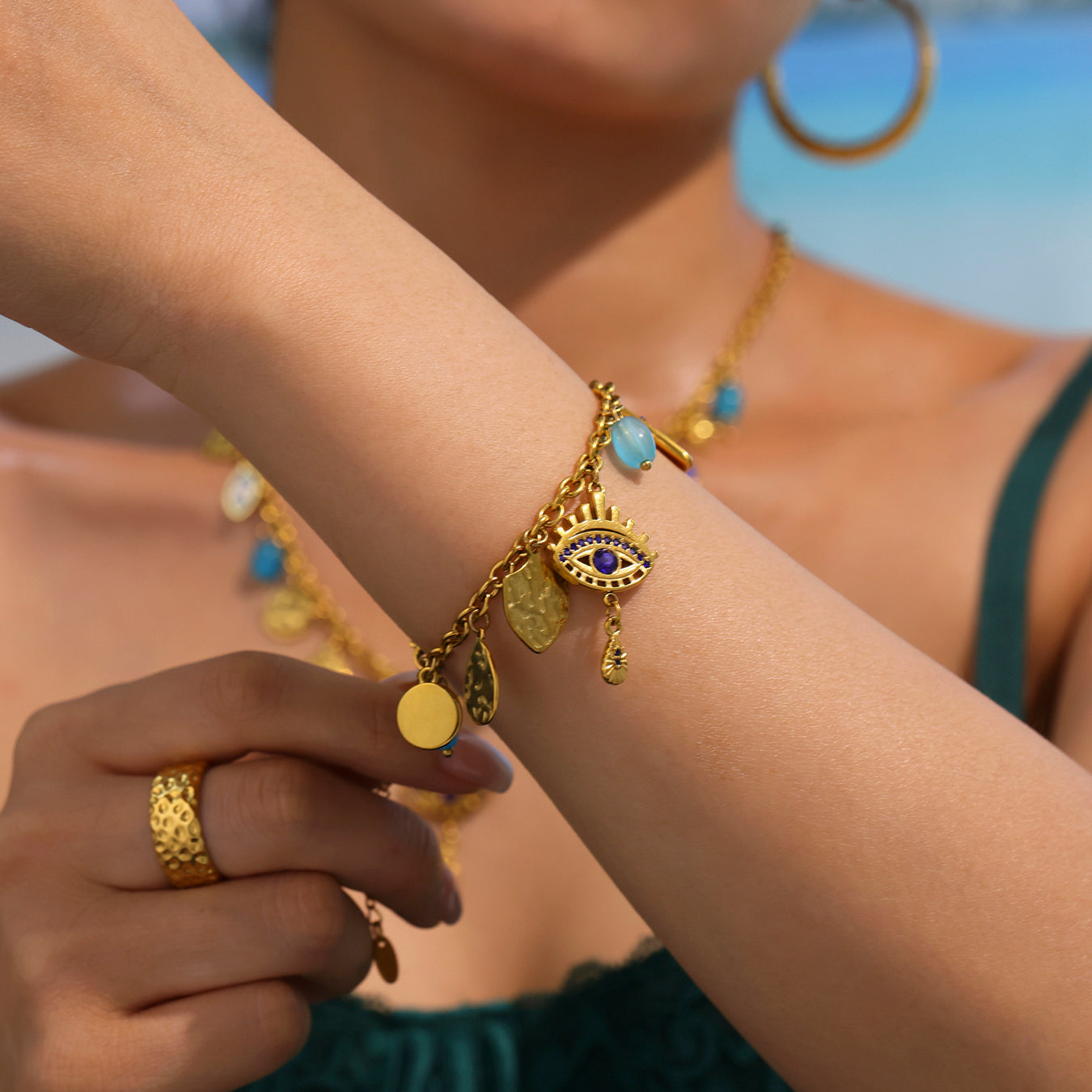 Close-up of female model wearing Green Mystic Eye Bracelet solo, showing bracelet details
